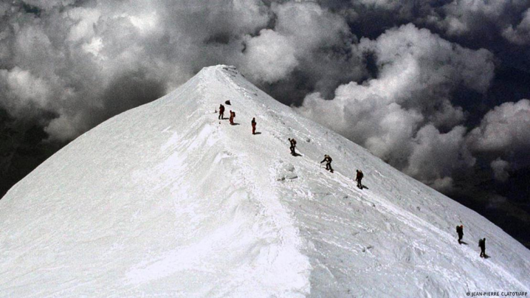 "Alpine Paradox: Balancing Tourist Trails with Climate Crisis"