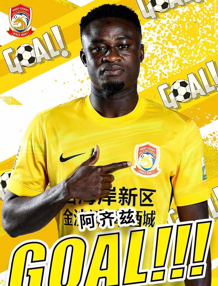 Male soccer player in a bright yellow jersey pointing to the team crest with a 'GOAL!!!' background banner, celebrating a goal.