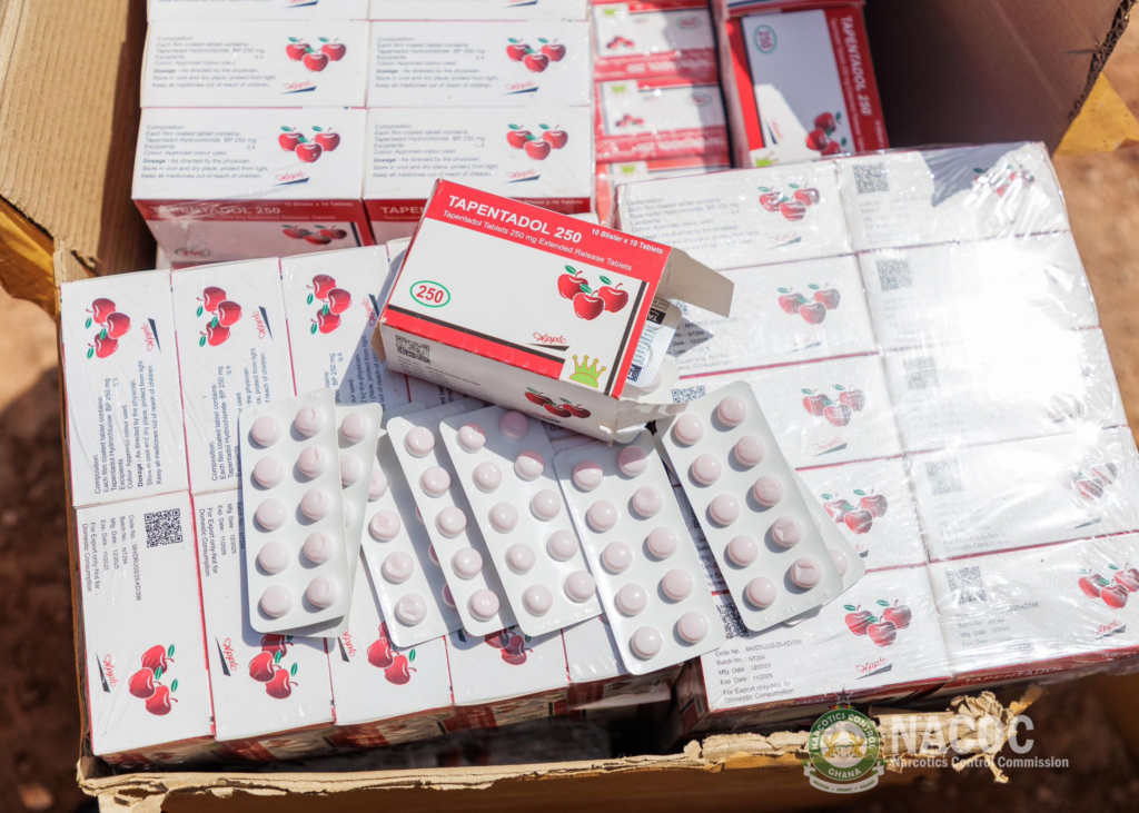 Boxes of Tapentadol 250 mg tablets with a cherry logo, some blister packs on top.