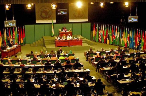 pap | Ghanaguardian.com Large international conference hall with delegates seated at long desks, numerous national flags lining the walls behind the stage.
