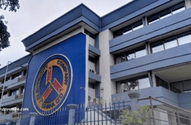 ECG-1-732x424-Copy | Ghanaguardian.com Exterior of the Ghana Police Command building with a blue facade and a circular seal on the front wall, gated entrance in the foreground.