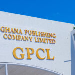 Ghana Publishing Company Limited sign with big GPCL letters on a white wall under a blue sky