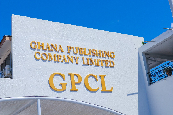 Ghana Publishing Company Limited sign with big GPCL letters on a white wall under a blue sky