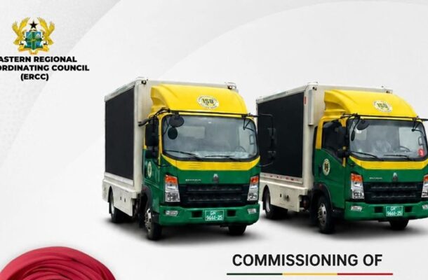 Two green-and-yellow delivery trucks side by side on a white background for an ERCC commissioning event, with near-top-left ERCC branding.