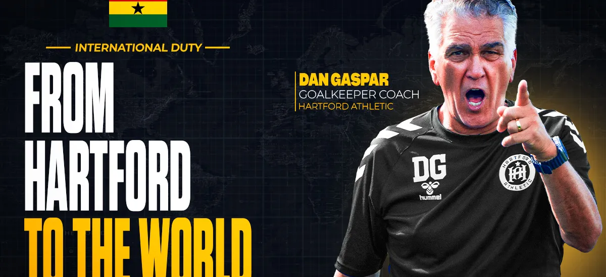 Sports promo banner showing Dan Gaspar, Hartford Athletic goalkeeping coach, shouting and pointing, with large text 'From Hartford to the World' and a Ghana flag above.