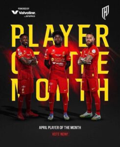 Promotional poster with three players in red kits before a dark background, large yellow 'PLAYER OF THE MONTH' text, and a 'VOTE NOW' CTA below.