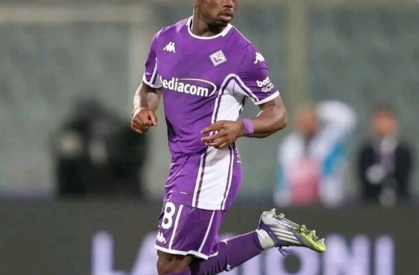 Soccer player in a purple kit sprinting on the field, number 81 on the shorts, white accents and cleats visible.