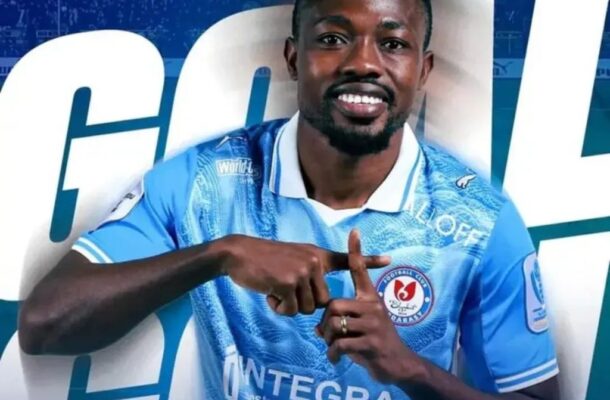 IMG_0542 | Ghanaguardian.com Football player in a light blue jersey smiling and making a celebratory hand gesture for a club poster or promo image.