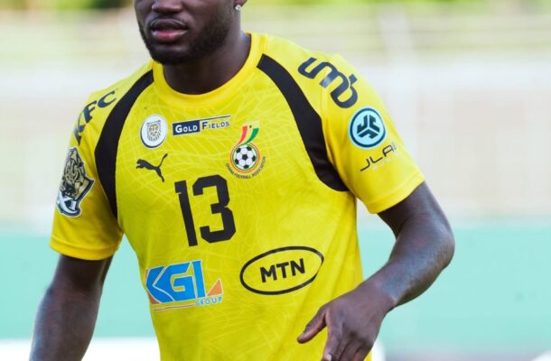IMG_0734 | Ghanaguardian.com Male soccer player in a bright yellow jersey with number 13, on a green outdoor field, mid-action.