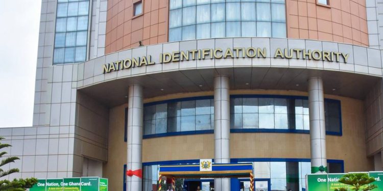 Front of a government building labeled 'National Identification Authority' with tall columns and a curved entrance, blue and beige exterior.