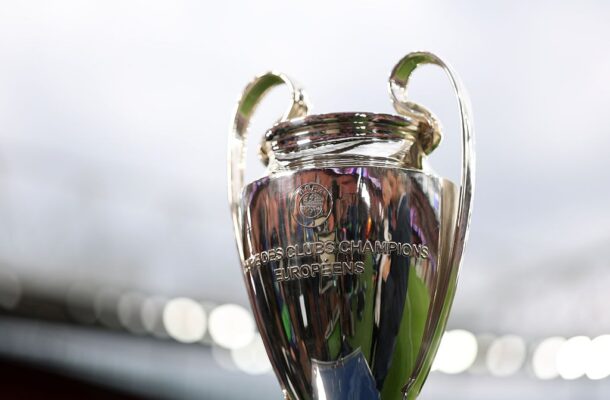 Shiny silver European club champions trophy with curved handles and engraved text on the front europeens logo visible.
