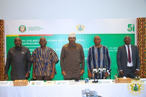 85690460 1 | Ghanaguardian.com Five men stand behind a white conference table with microphones, during a formal press briefing; a green backdrop bearing official logos and text suggests an ECOWAS ministerial meeting, with one man wearing a traditional cap.