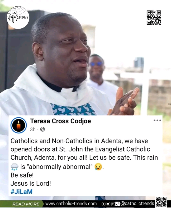 Photograph of a man in a white clerical robe speaking with his hands raised. A social media post banner is visible at the bottom, mentioning Catholics and Non-Catholics in Adenta opening doors at St. John the Evangelist Catholic Church and safety tips, with a rain emoji. A Catholic Trends logo sits in the top-left and a QR code in the top-right.