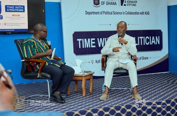 IMG-20260605-WA0068 | Ghanaguardian.com Two men sit on stage in chairs, one speaking into a microphone with a banner behind reading 'TIME WITH A POLITICIAN'.