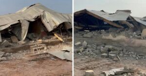 Two collapsed buildings with crumpled corrugated metal roofs and rubble strewn across dusty ground.