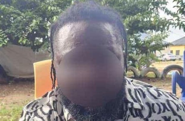 IMG-20260622-WA0012 | Ghanaguardian.com Man with dreadlocks and a blurred face wearing a black-and-white patterned shirt outdoors.