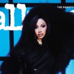 Woman wearing a dramatic black fur coat poses against a blue grid background with the word 'all' and 'THE BEAUTY EXPERT' visible.