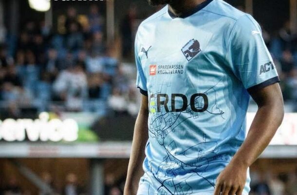 Footballer in a light-blue jersey on the field with a crowd in the background; text reads 'Tak for indsatsen, Hakim'.