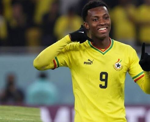 IMG_0854 | Ghanaguardian.com Soccer player in a yellow Ghana national team jersey with number 9 celebrating on the pitch.