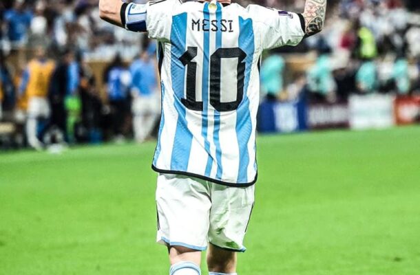 IMG_0961 | Ghanaguardian.com Argentina footballer Messi (No. 10) raises both arms in celebration on the field, back view with fans in the stands.