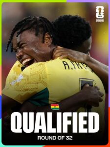 Two Ghanaian football players embrace in celebration, with the word 'QUALIFIED' and 'ROUND OF 32' on a graphic that includes the FIFA World Cup 2026 logo.
