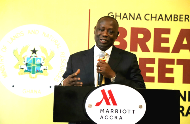 Screenshot-2026-06-02-121400 | Ghanaguardian.com Man in a suit speaking at a podium with a microphone at Marriott Accra, Ghana; banner in the background reads 'Ghana Chamber' and 'Break'.