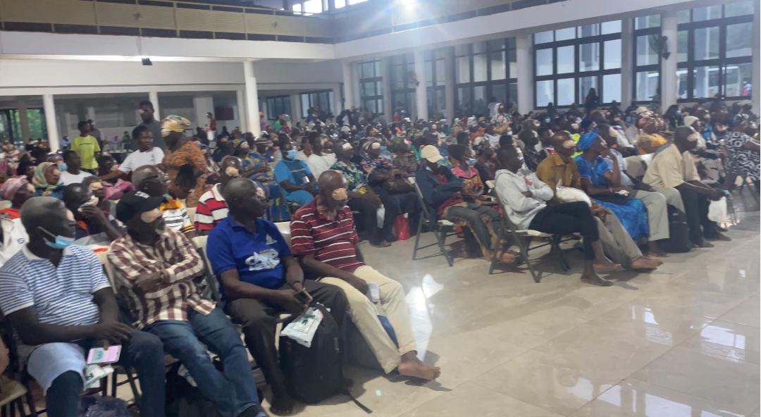 WhatsApp Image 2026-06-24 at 091601 | Ghanaguardian.com Large indoor hall full of people seated in rows, many wearing masks, attending an event or gathering.