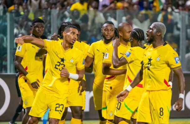 blask stars | Ghanaguardian.com A group of soccer players in bright yellow uniforms celebrate on the field as teammates high-five and gesture, with fans in the stands behind them.