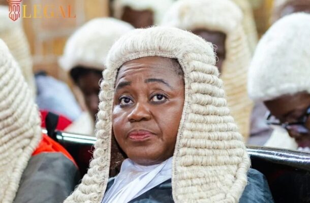 IMG-20260706-WA0009 | Ghanaguardian.com African female lawyer wearing a white powdered wig and black robe, seated in a courtroom.