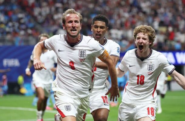 IMG_1151 | Ghanaguardian.com Three England players celebrate a goal on the pitch, wearing white jerseys with red numbers and an armband visible on one player.