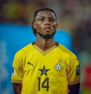 IMG_1170 | Ghanaguardian.com Ghana national football team player wearing a yellow jersey with number 14, standing on the field with a focused expression.
