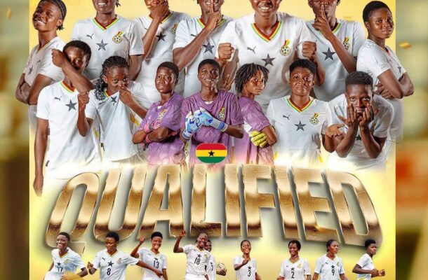 IMG_1247 | Ghanaguardian.com Group of Ghanaian women's soccer players in white uniforms pose together, celebrating qualification with a large 'QUALIFIED' banner and Ghana flag motif in the foreground.