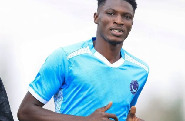 IMG_1303 | Ghanaguardian.com Young man in a light blue soccer jersey jogging outdoors, looking at the camera with a slight smile.