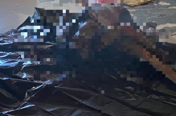 Vincent amponsah | Ghanaguardian.com Body covered by a black plastic sheet on a tiled floor inside a room (image is pixelated).