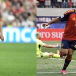 Two soccer players in red Belgium kits share the frame: left player #17 dribbles the ball, right player #21 points and runs forward as a goalkeeper lies in the background.