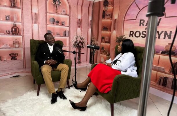 WhatsApp-Image-2026-07-15-at-92705-AM | Ghanaguardian.com Two people sit in green armchairs on a pink-themed TV set, speaking into microphones during an interview.