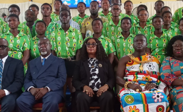 chief-750x375 | Ghanaguardian.com Group portrait at a formal event: five seated adults in front row, with a large crowd in matching green shirts behind them.