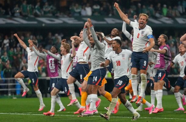england | Ghanaguardian.com England football players celebrate a goal on the field, arms raised in jubilation, wearing white jerseys and navy shorts.