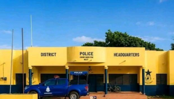 Kwame Danso | Ghanaguardian.com Yellow district police headquarters with a blue police pickup parked at the front and the words 'DISTRICT POLICE HEADQUARTERS' on the facade.