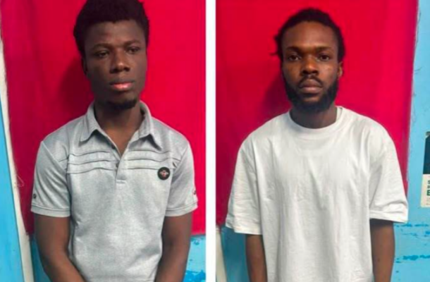 image_2026-08-05_184629462-696x442 | Ghanaguardian.com Two young men stand side by side against a red backdrop, each wearing a casual shirt and looking at the camera, neutral expressions.