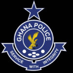 Ghana Police emblem: blue circular badge with a star above, reading 'Ghana Police' and the motto 'Service with Integrity' on a black background.