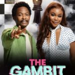 Poster for 'The Gambit' featuring Aikou and Flora: a man in a green jacket points toward the camera beside a woman in a white polka-dot blouse. A large chess king looms behind them amid a black-and-white checkered background; bold pink and teal title 'THE GAMBIT' with smaller text 'Aikou and Flora'.