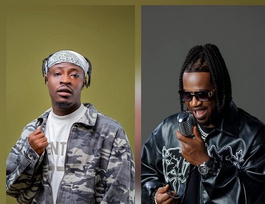 Two men posing side by side; left wears a camo jacket and bandana, right wears a black leather jacket with braids and sunglasses, holding a microphone.